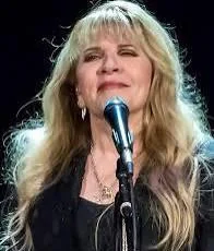 Out of Stevie Nicks, Madonna, Paula Abdul, Janet Jackson, Mariah Carey, Whitney Houston and atm Taylor Swift, who is the most and least famous? picture 4 of 7