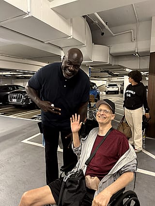 Shaq in the carport'
