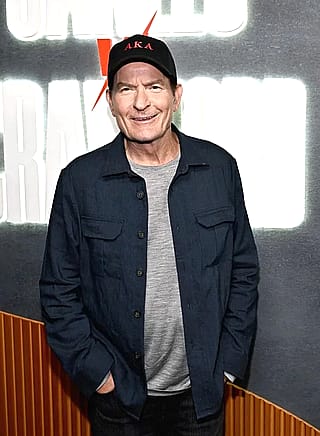 Not judging, just asking, is Charlie Sheen bi and living with a guy now?'