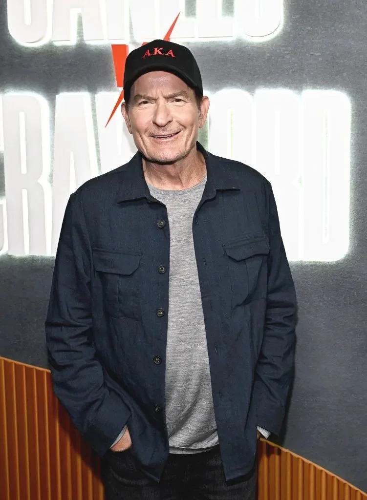 Not judging, just asking, is Charlie Sheen bi and living with a guy now? picture 1 of 1
