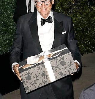 What's in the box Bill Gates gives to Kris Jenner at her 70th birthday party?'