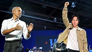 Who was next to Obama in this rally? Anyone know? He seems famous'